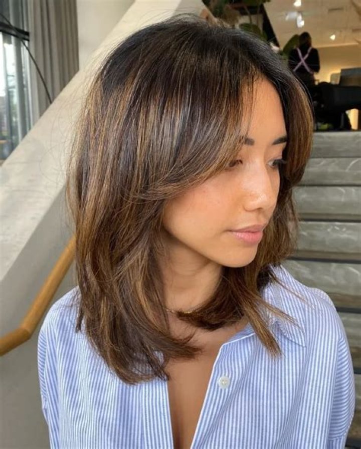 Captivating Beef Curtain Bangs: Enhance Your Style